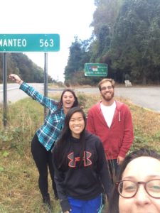 Dani, Molly, Christian, and Sam pose at the Highway 64 sign on the border of NC and TN.