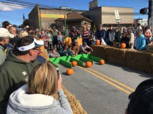 Contestants roll their pumpkins down the hill at the annual Franklin Festival.