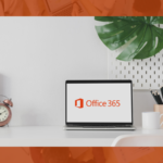 laptop on a desk with Office 365 logo displayed