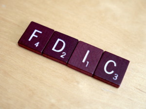 Scrabble pieces spelling FDIC
