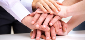575x270-panoramic_Collaboration_Hands_Together_14362